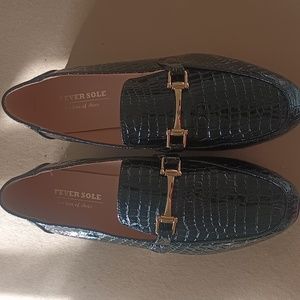 Black embossed loafers